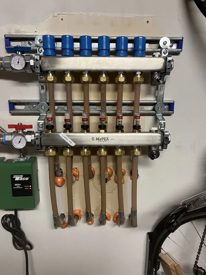 Plumber performing Water Heater Repair at a residential property in McCall